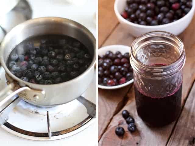 Blueberries simmering in a small sauce pan.