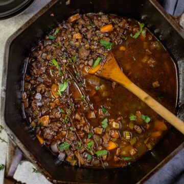 A pot of smoked sausage and lentil soup