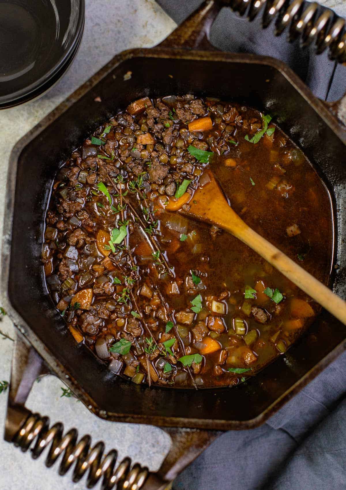 A pot of smoked sausage and lentil soup