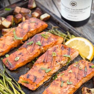 grilled salmon and wine bottle.