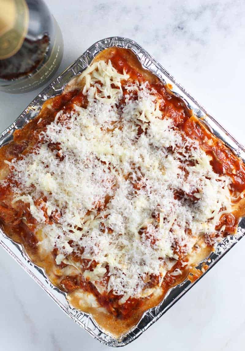 Gift ideas for new parents or housewarming is smoked lasagna in a pan.