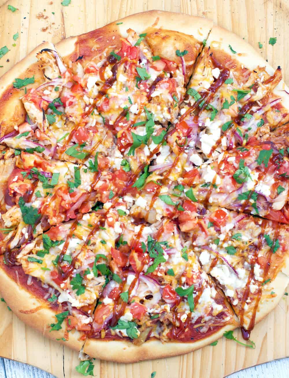 Smoked BBQ Chicken Pizza drizzled with bbq sauce