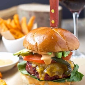 Smoked Mexican Burgers with Chorizo and Smoked Poblanos. How to smoke burgers on the smoker and finish them on the grill, plus this incredible recipe to try out! So full of incredible smoky, spicy, savory flavors!