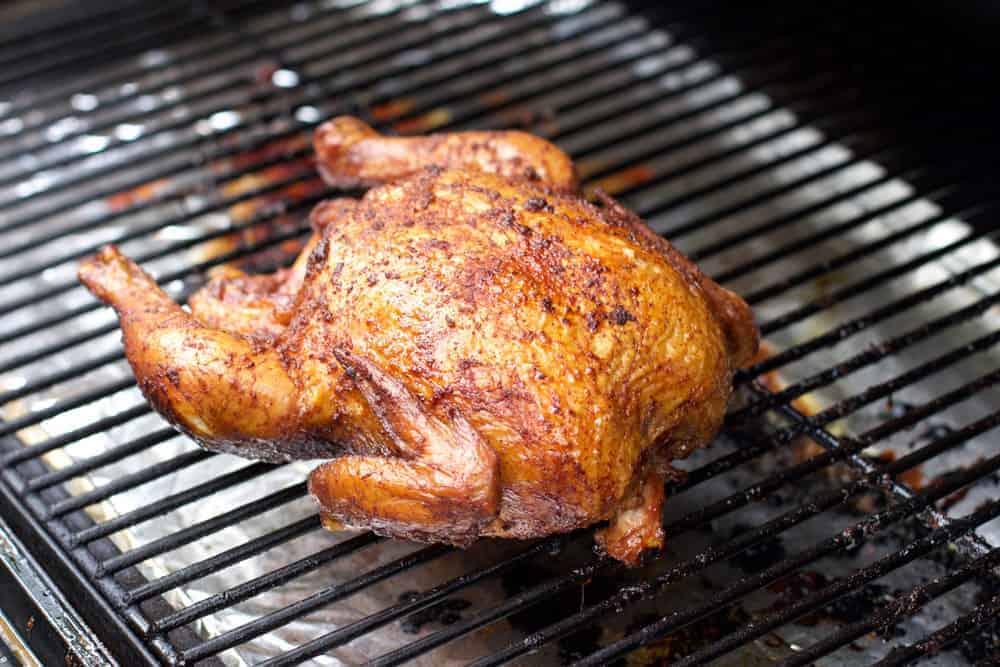 A Whole Roaster Chicken cooked on a Smoker