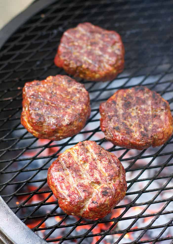 Turkey patties cooking on the grill