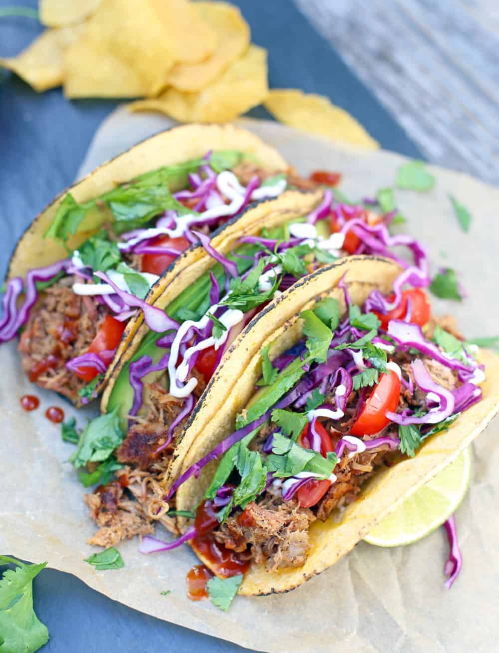Three Pulled Pork Tacos on a serving dish