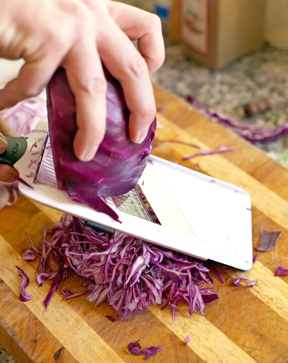 using a mandolin to slice cabbage