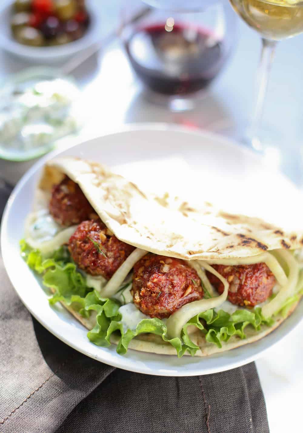 Smoked Lamb Meatball Pita Sandwiches. 