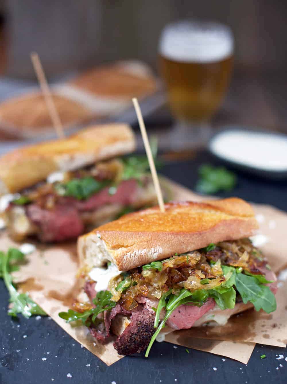 Smoked Prime Rib Steak Sandwiches. on a plate. 