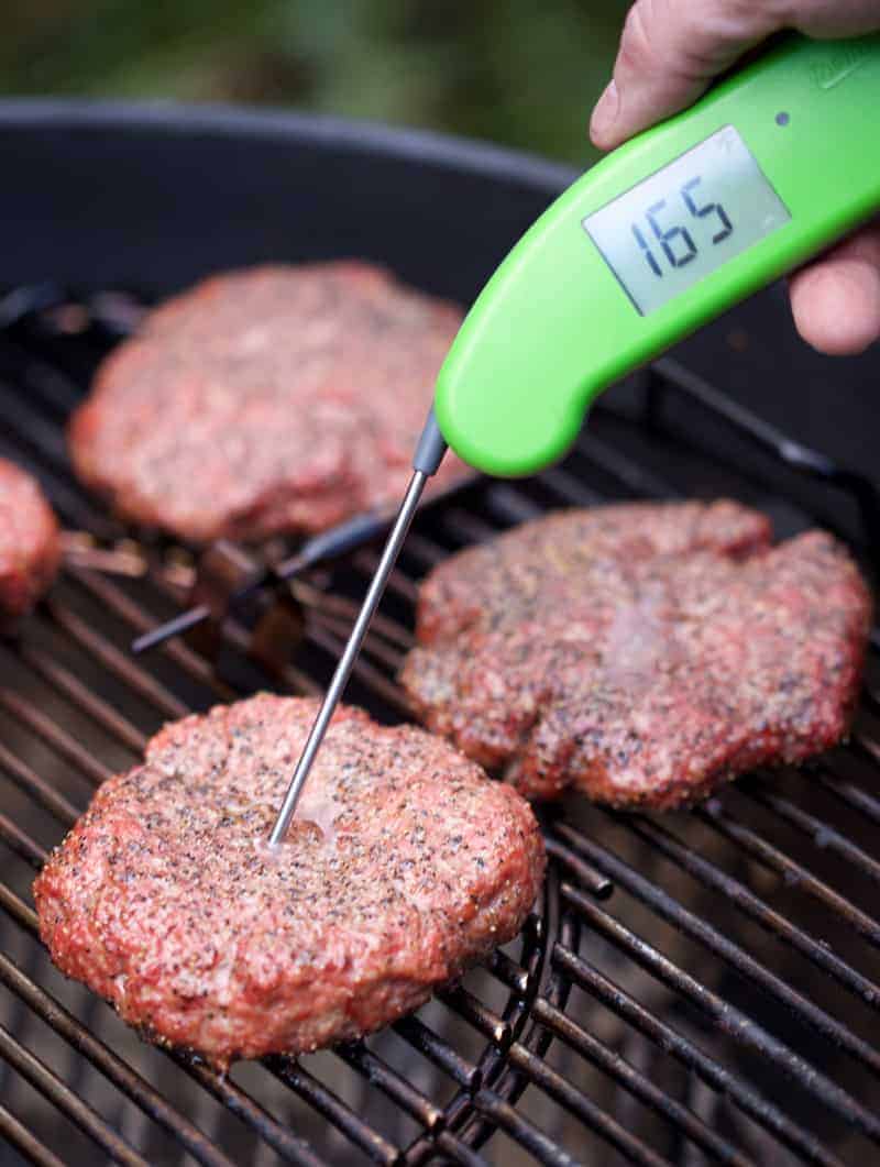 Using a Thermoworks Instant Read Thermometer- to check the lamb burgers temp.