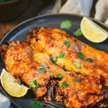 close up of pulled pork enchiladas