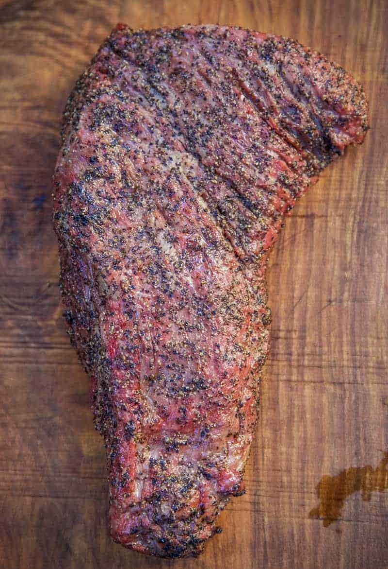 Smoked Marinated Tri Tip resting on a cutting board