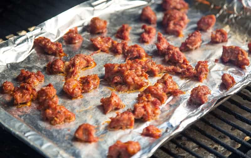 Sausage cooking on the grill.