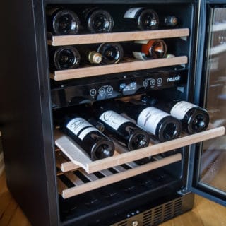 NewAir Black Stainless Steel Wine Cooler, 46 Bottle Dual Zone