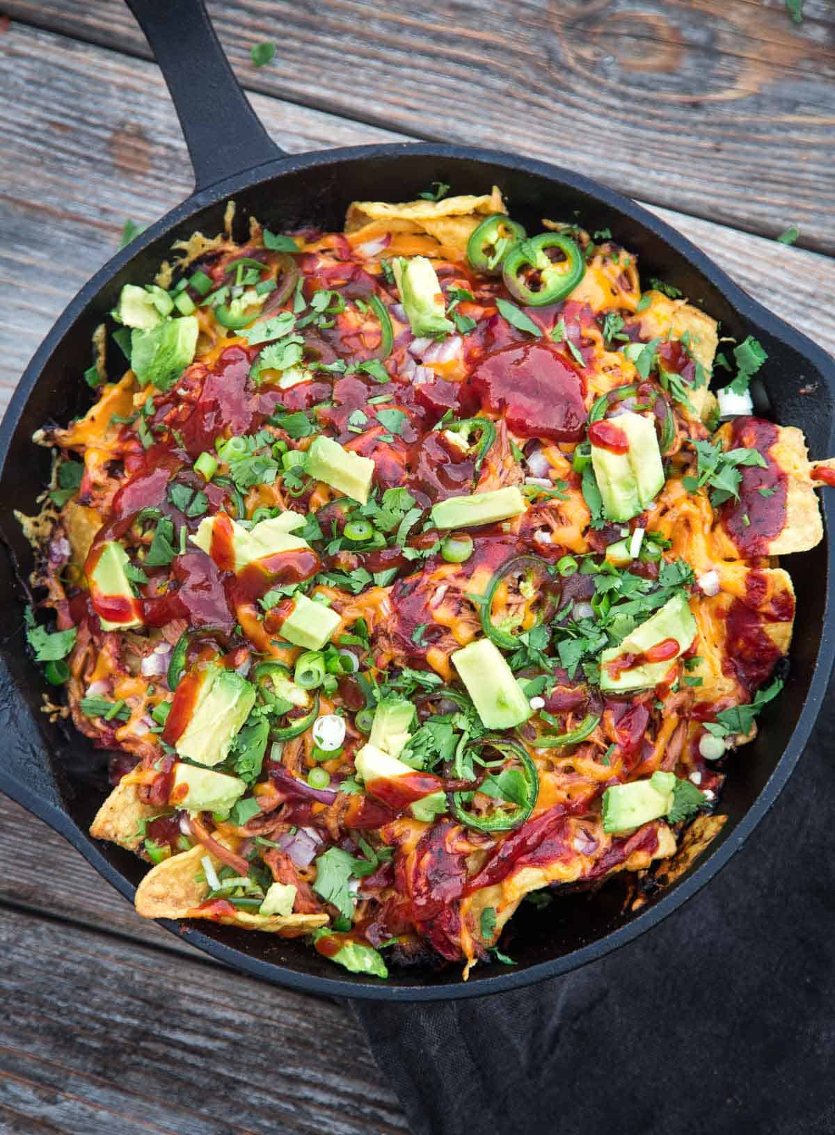 Pulled Pork Nachos in a cast iron pan