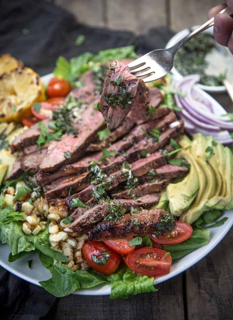 Grilled Flank Steak served over greens for a salad
