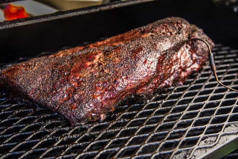 Smoked brisket prior to being wrapped with dark mahogany color.