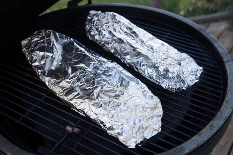 Meat wrapped in foil on the grill 