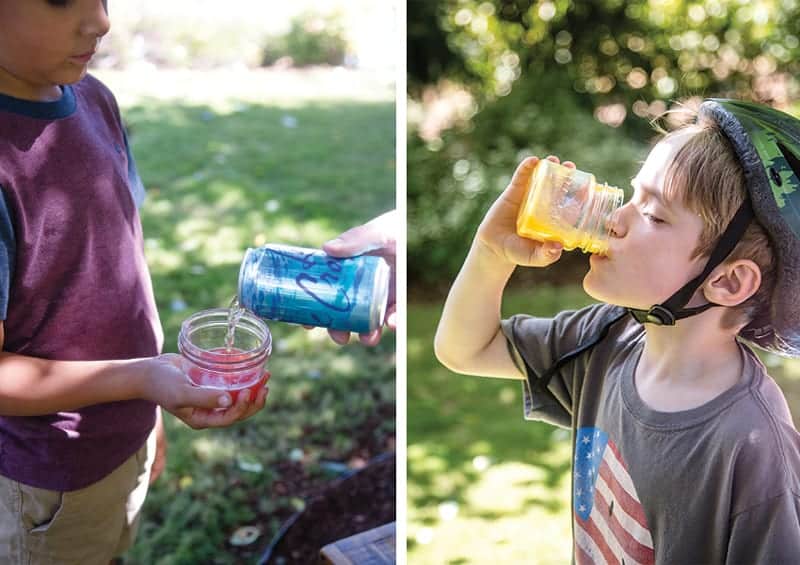 Kids drinking from a mason jar