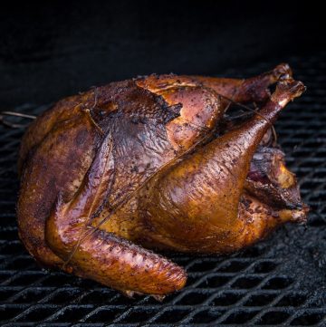 Bourbon Brined Smoked Turkey cooked on a Smoker