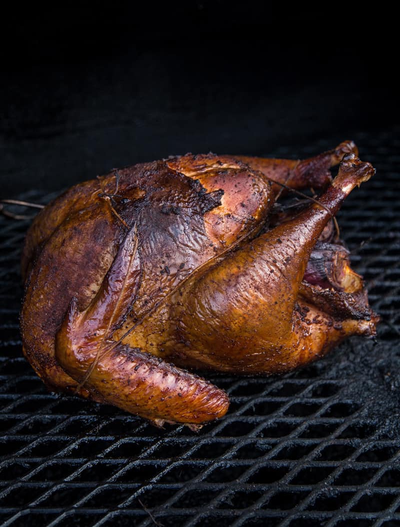 Bourbon Brined Smoked Turkey cooked on a Smoker