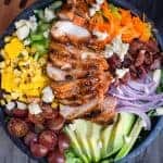 Grilled Buffalo Chicken Salad in a large black serving bowl