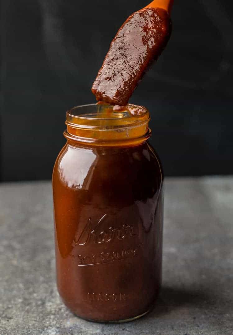 Mason jar filled with homemade Kansas City Style BBQ sauce