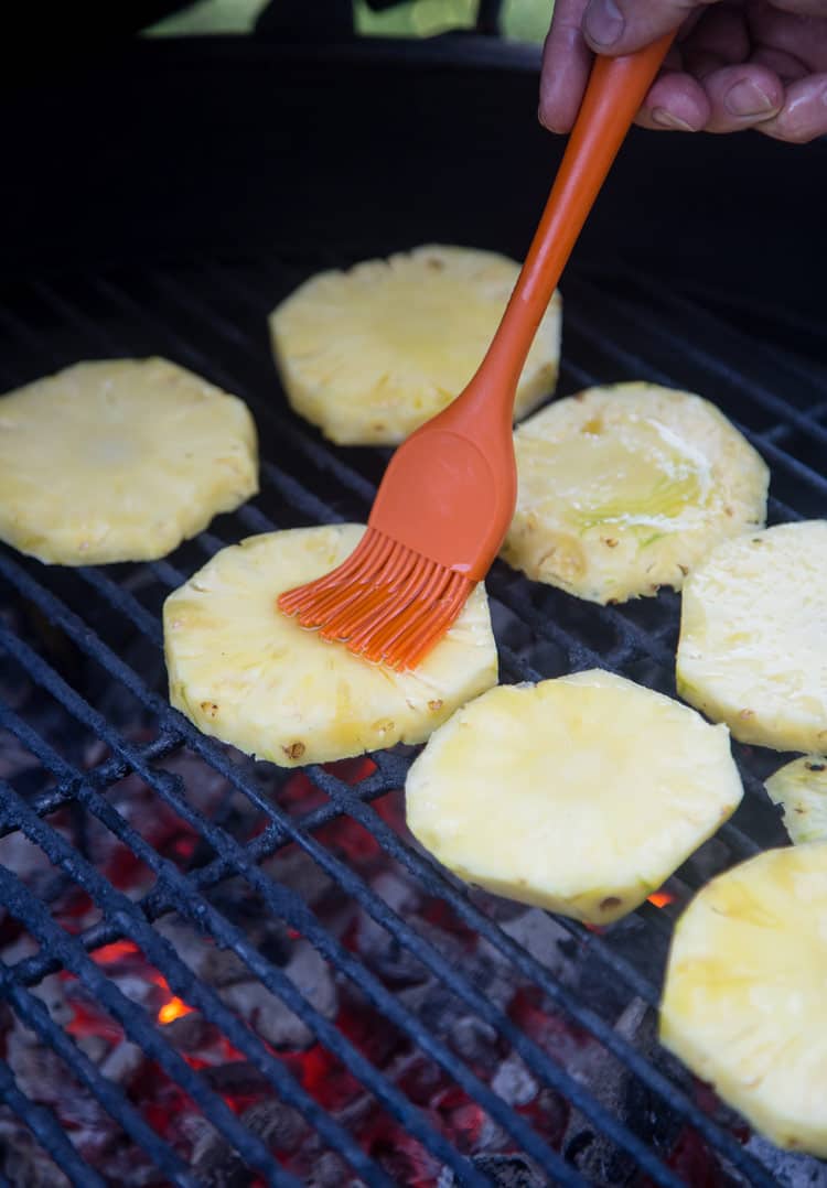 Pineapple slices cooking on a hot grilll
