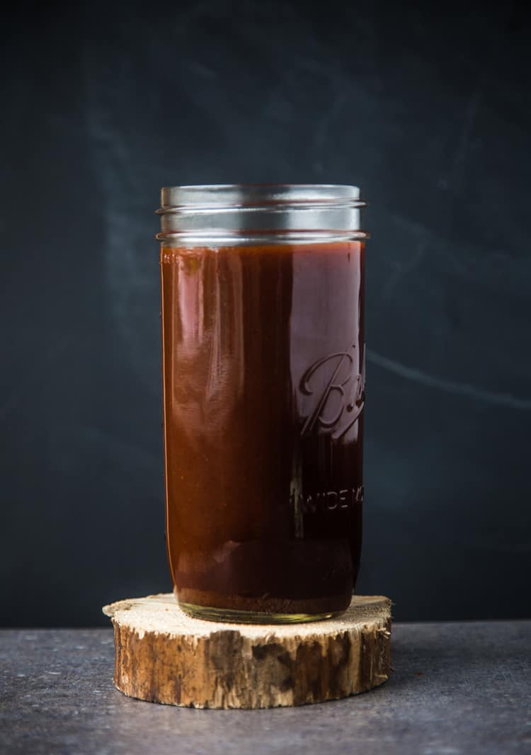 VInegar based BBQ sauce in a mason jar for storage.