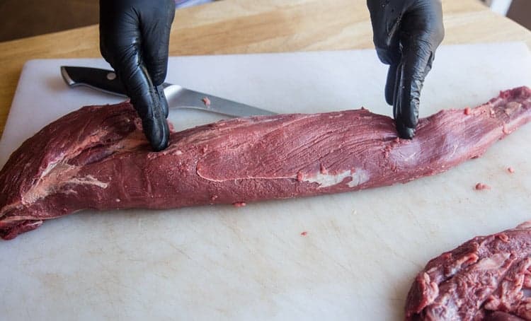 Trimming a beef tenderloin