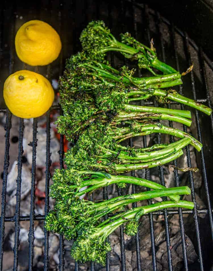 Cooking broccolini and lemon on the grill