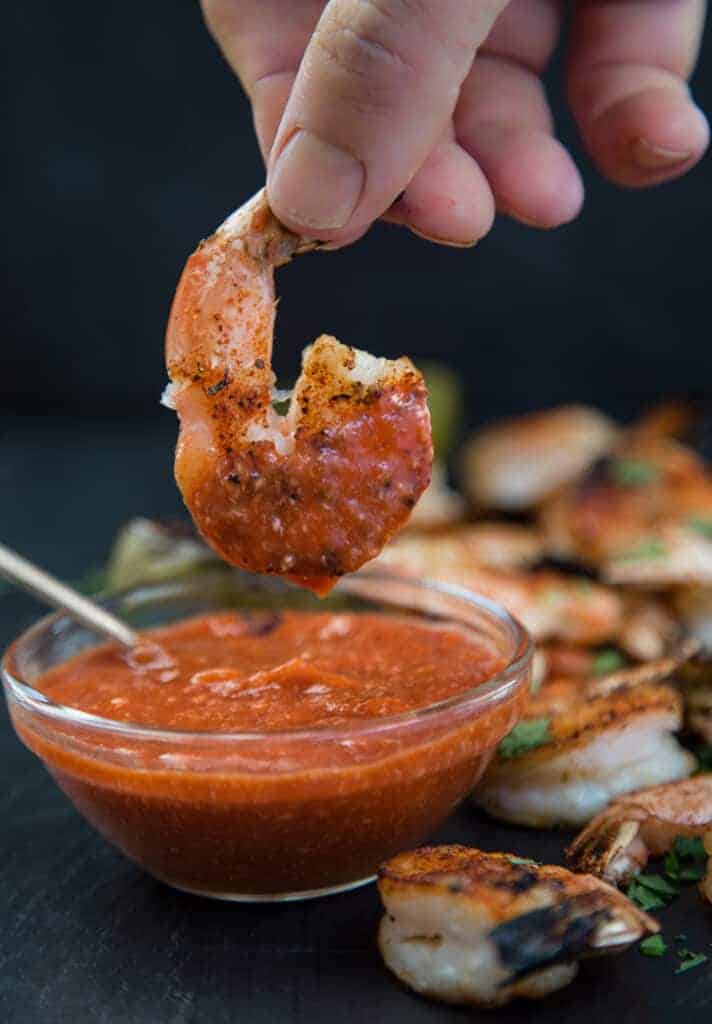 Grilled Shrimp dipped in a spicy cocktail sauce. 