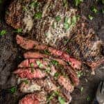 Grilled Bavette Steak sliced thin on a cutting board