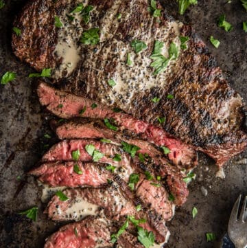 Grilled Bavette Steak sliced thin on a cutting board