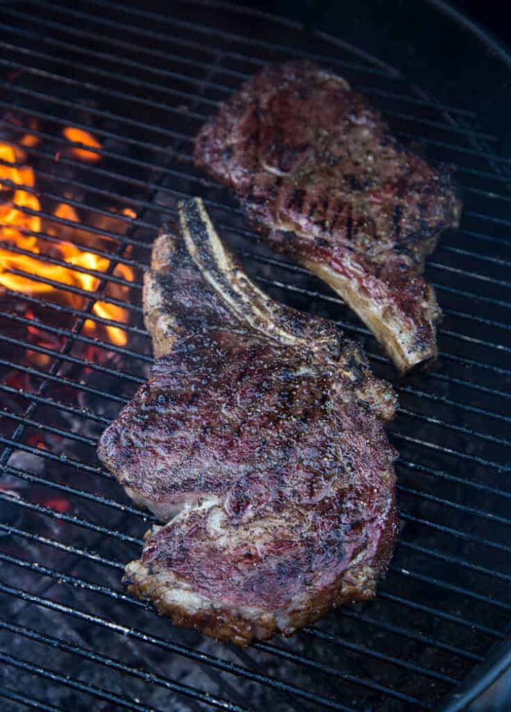 Two Ribeye Steaks on a grill using the Reverse Sear method of cooking. 