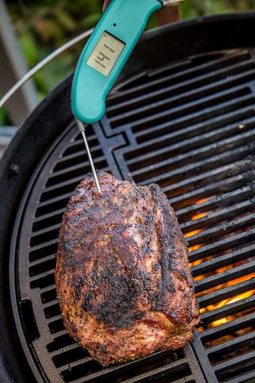 Thermapen inserted into a Pork Collar to take the internal temperature of the meat