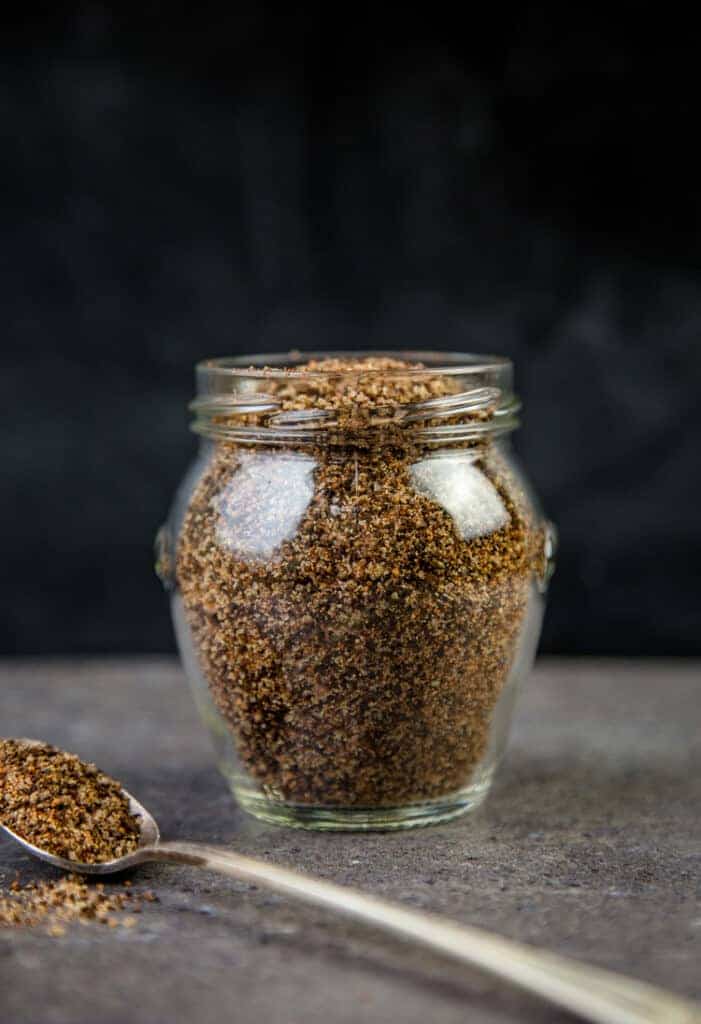 Coffee and Ancho Chili dry rub for Steaks in a glass jar.
