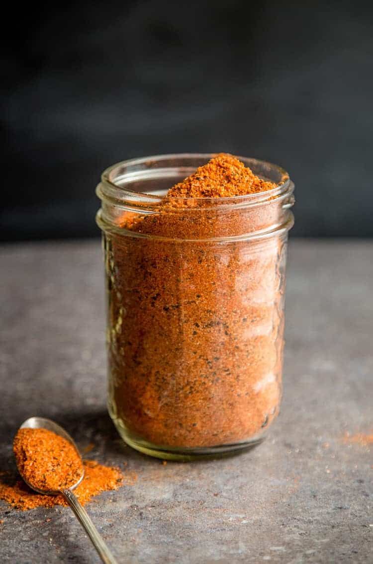 A mason jar filled with seafood seasoning