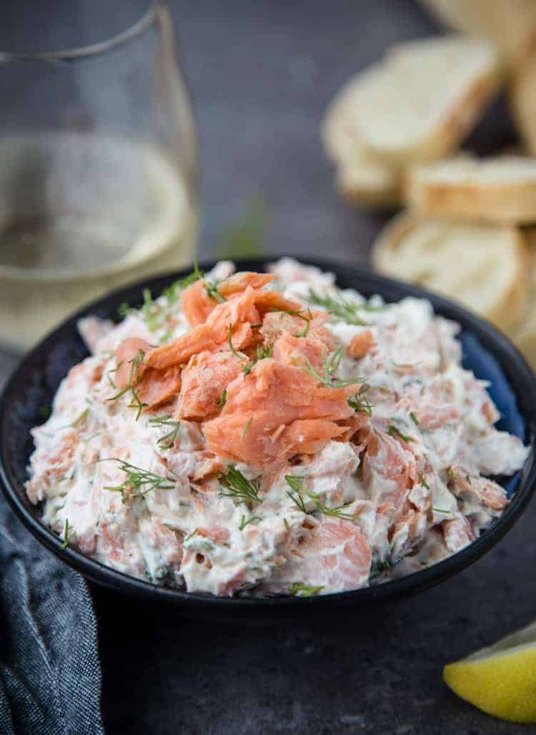 The best Smoked Salmon Dip served in a bowl with fresh dill