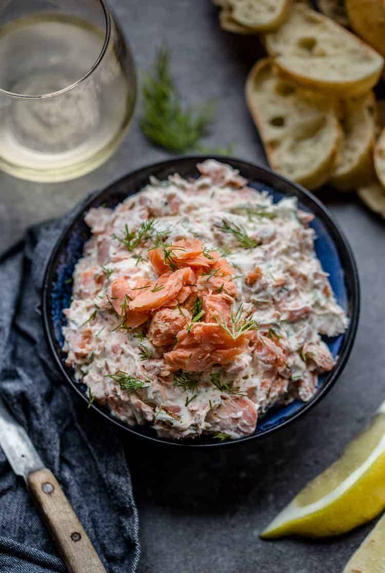 Smoked Salmon Spread in a bowl with wine.