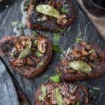 Grilled Filet Mignon topped with a mushroom brown butter sauce with pinterest text