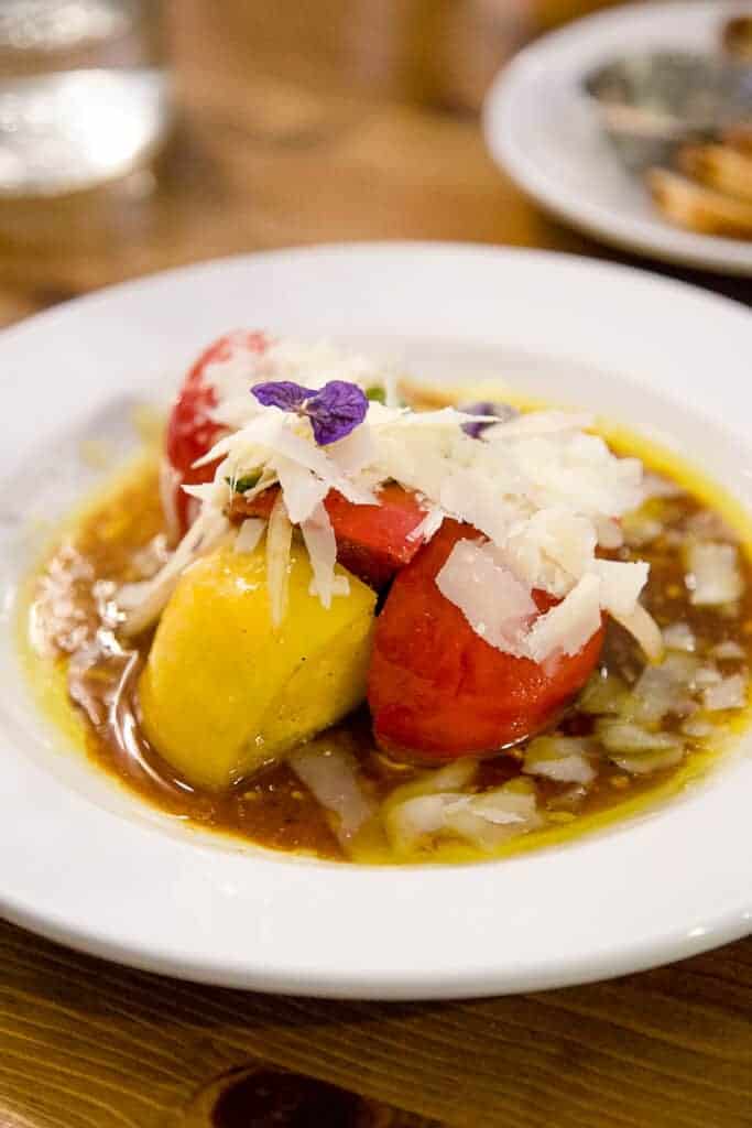 tomatoes with cheese in broth