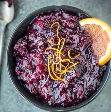 Homemade cranberry sauce with orange zest garnish