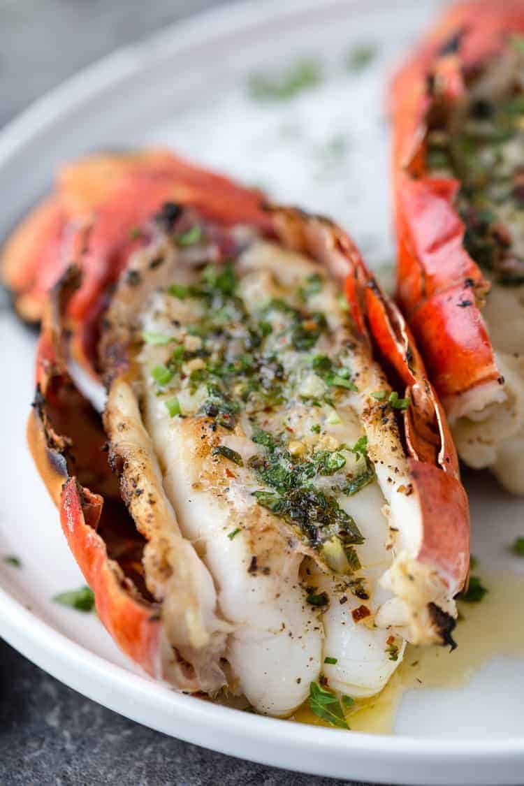 Grilled lobster tails with red chili pepper herb butter vindulge