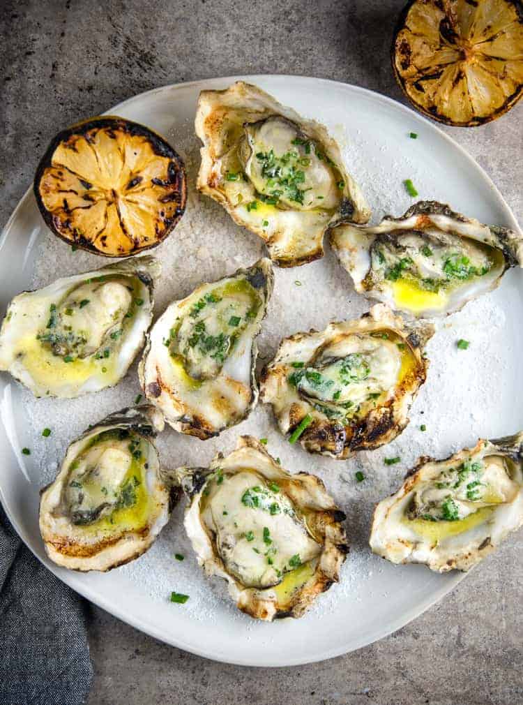 Grilled Oysters served with a wine butter sauce