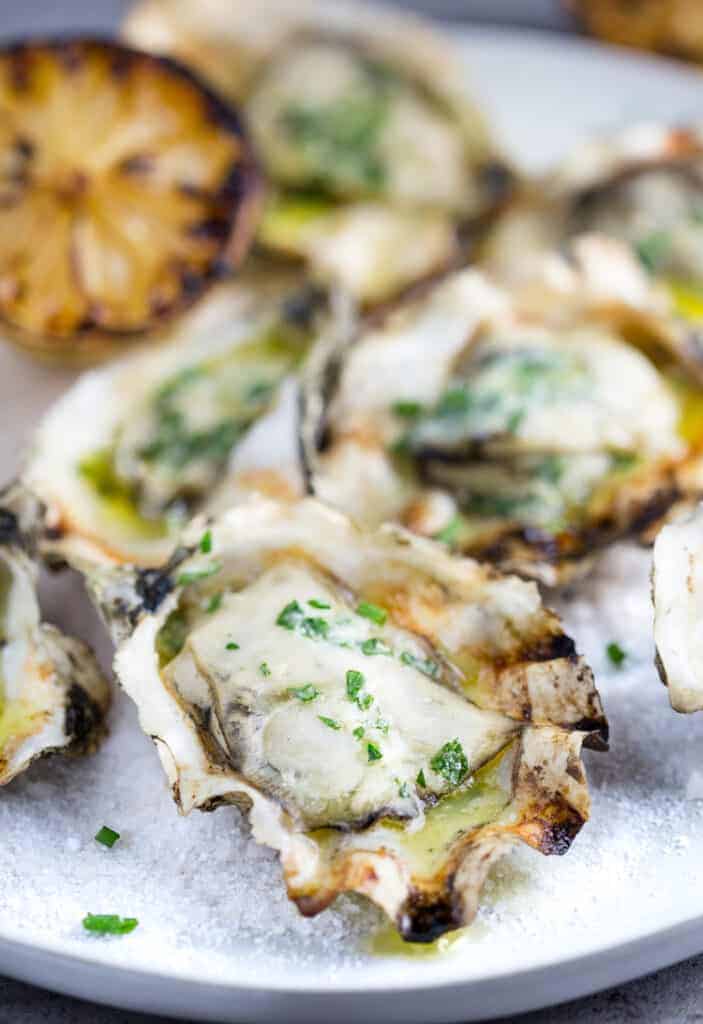 Grilled Oyster on a platter with salt