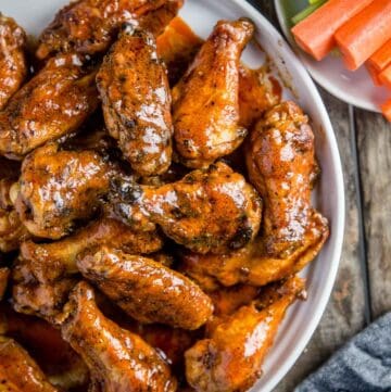 Smoked Buffalo Chicken Wings with Crispy Skin on a serving platter