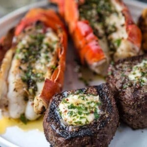 Surf and Turf on a plate with compound butter.