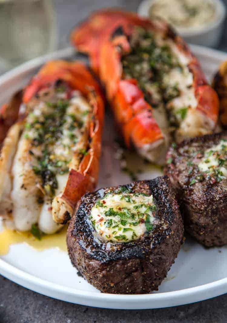 Surf and Turf on a plate with compound butter.