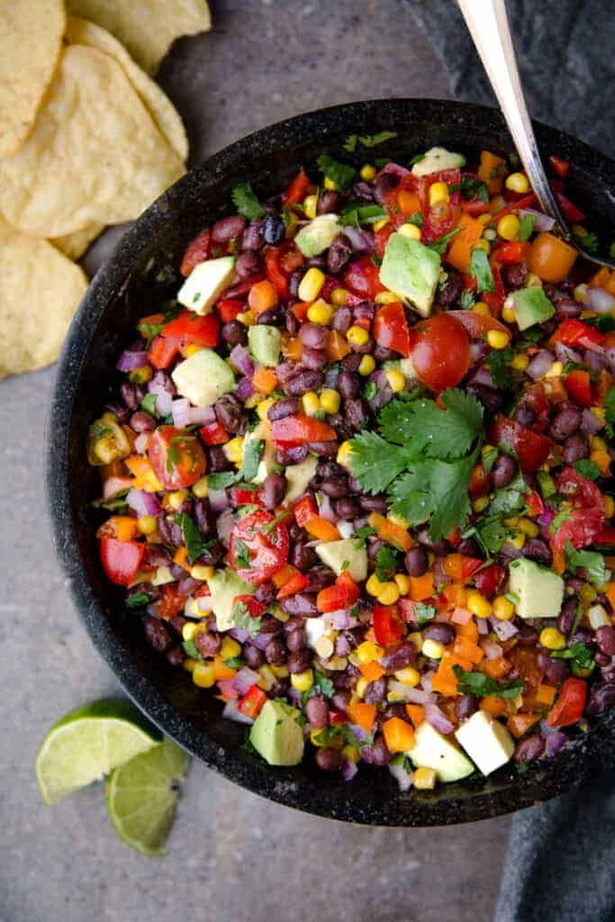 black bean salad served with chips